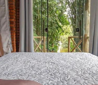 Antonio Carlos Cabin | Serene Suite with Waterfall and Oceanfront Amenities