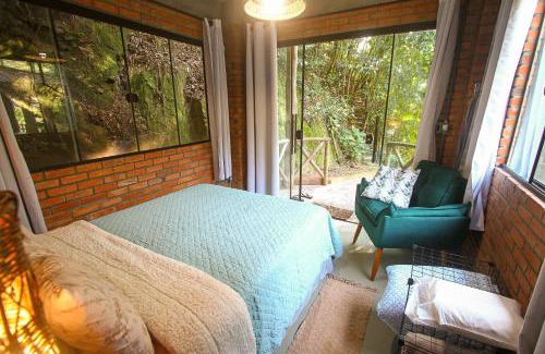 Antonio Carlos Cabin | Serene Suite with Waterfall and Oceanfront Amenities