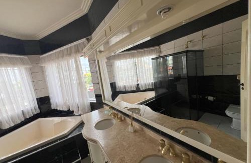 Sinop House | Indulge in a Downtown Suite with Hot Tub & Closet Space