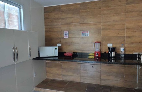 Sao Vicente de Paula Apartment | Ocean View Suite with Gourmet Area, Near Praia dos Anjos