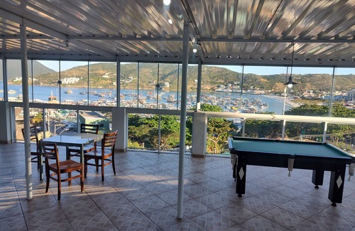 Sao Vicente de Paula Apartment | Ocean View Suite with Gourmet Area, Near Praia dos Anjos