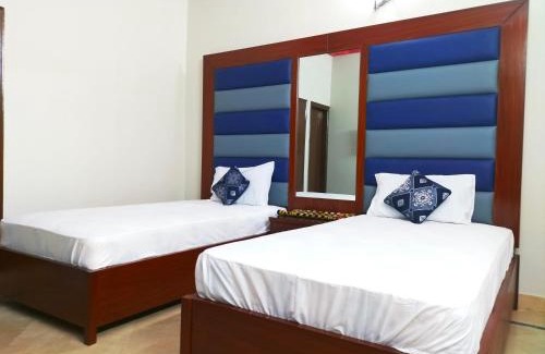 Gulshan-e-Iqbal Bed & Breakfast | Cozy Subhan Palace: Pet-Friendly Stay near Millennium Mall