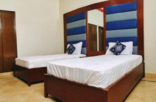 Gulshan-e-Iqbal Bed & Breakfast | Cozy Subhan Palace: Pet-Friendly Stay near Millennium Mall