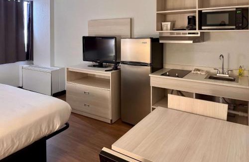 East Syracuse Hotel | Suburban Studios East Syracuse Carrier Circle
