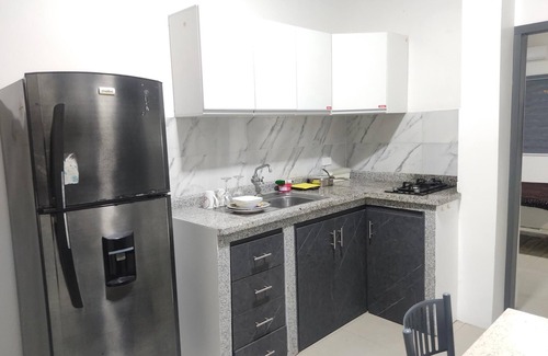 Portoviejo Apartment | Cozy Suite with Garage, Secure Near Rotonda Park