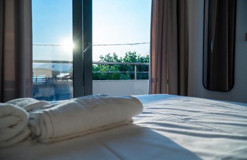 Agiokampos Apartment | Adonis Suite Apartment: Top-Rated with Oceanfront Bliss