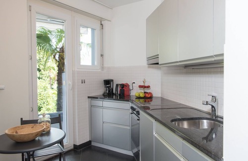 Ascona Apartment | Modern Suite at Interhome with Lake Views & Spa Access