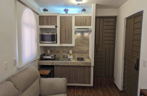 Tepotzotlan Apartment | Modern Comfort Suite Nube: 4-Star Spa & Family Friendly