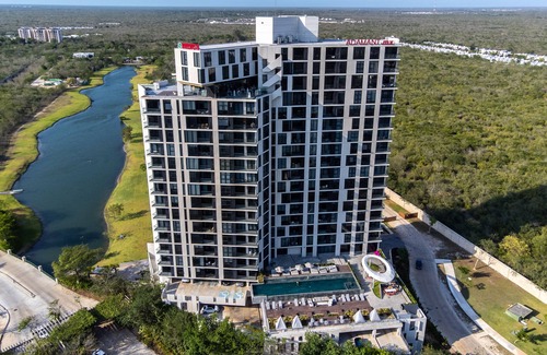 Merida Apartment | Elegant Sky Roof Suite with Lagoon View in Mérida Norte