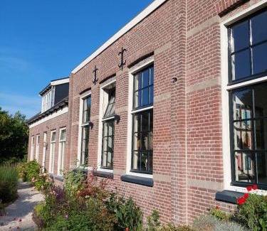 Zonnemaire Apartment | Unique Stay in a Former Classroom - Pet Friendly Retreat