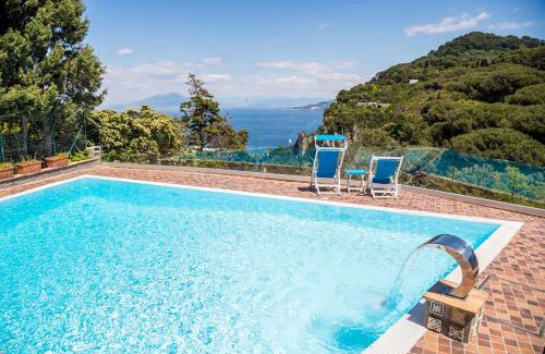 Tiberio House | Relax at Suite Villa Carolina: 4-Star Oceanfront Retreat