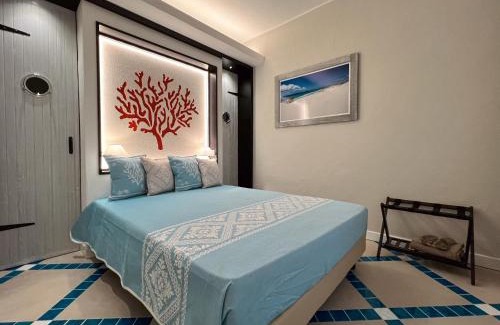 Porto Pino Apartment | Experience Suite Villa Corallo Rosso: 4-Star Oceanfront Retreat