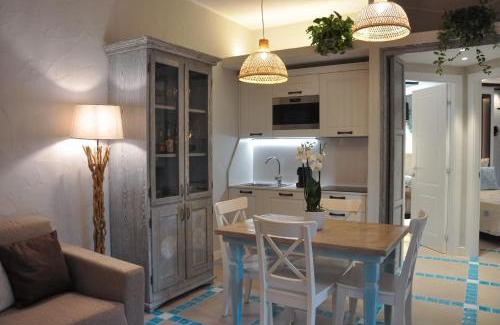 Porto Pino Apartment | Experience Suite Villa Corallo Rosso: 4-Star Oceanfront Retreat