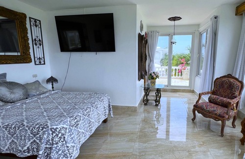 Cabrera Hotel | Relax in a Suite with Pools & Ocean View Balcony