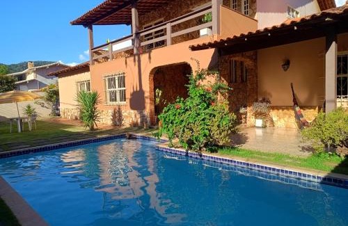 Nogueira Apartment | Discover SUITE na SERRA 4: Pool & Ocean View Retreat