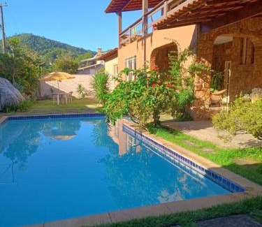 Nogueira Apartment | Discover SUITE na SERRA 4: Pool & Ocean View Retreat