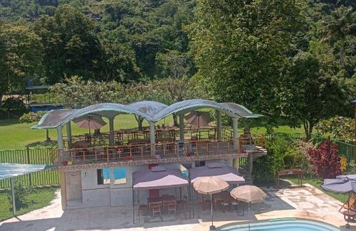 Tingo Maria Apartment | Discover Suites el CHULLO: Family-Friendly Retreat with Pool