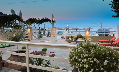 Chrisi Akti Apartment | Discover Suites Pierion Musses: Oceanfront Bliss Awaits
