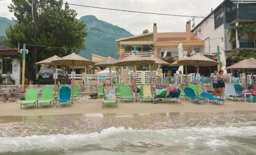 Chrisi Akti Apartment | Discover Suites Pierion Musses: Oceanfront Bliss Awaits