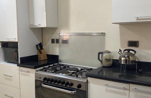 Ikoyi Apartment | Discover MacDonald Apartments: Family-Friendly Retreat with Pool