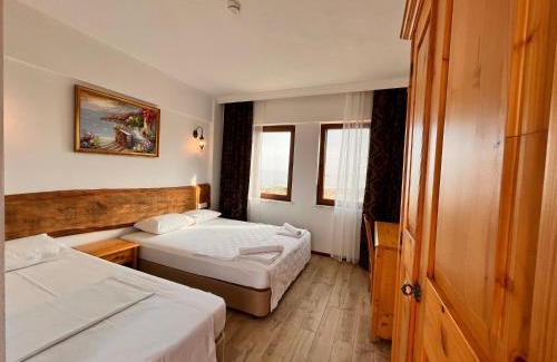 Bozcaada Hotel | Relaxing Sukha Inn Hotel & Beach with Oceanfront Views