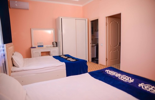 Jalal-Abad Hotel | Discover Sultan Jalal-Abad: Family-Friendly with Pool & Breakfast