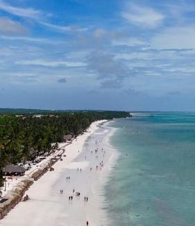 Kiwengwa Hotel | Experience Sultan Sands Island Resort & Spa | Beachfront Bliss