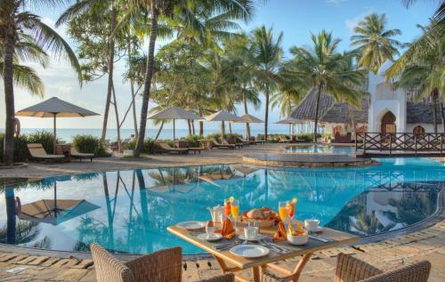 Kiwengwa Hotel | Experience Sultan Sands Island Resort & Spa | Beachfront Bliss