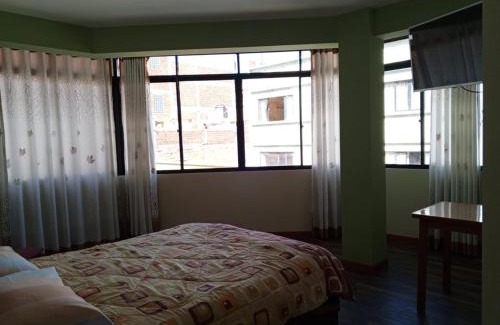 Copacabana Apartment | Jhonyximena: Family-Friendly Stay with Delicious Dining