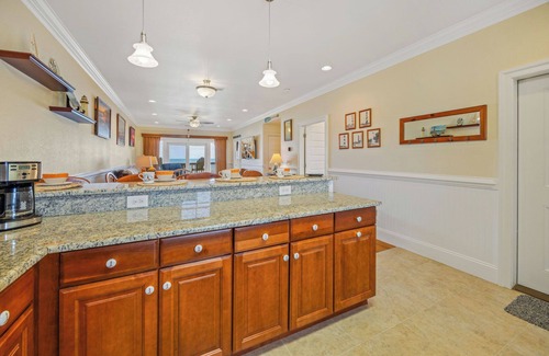 Kinnakeet House | SUMMER SAVINGS - Oceanfront Condo with Resort Swimming Pool and Beach Boardwalk