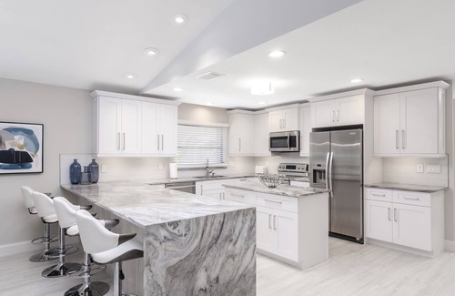 Naples Park House | Exceptional 5-Star Home with Free Beach Shuttle & Pool