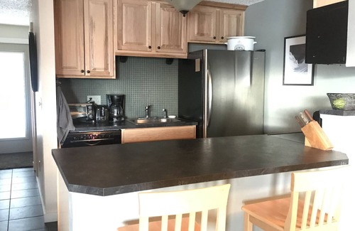 Wildernest Condo | Mountain Retreat with Lake Views & Family-Friendly Amenities