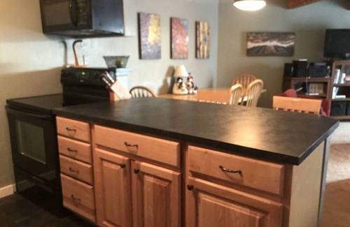 Wildernest Condo | Mountain Retreat with Lake Views & Family-Friendly Amenities