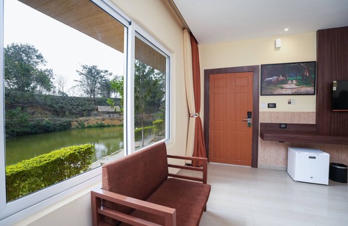 Samaguri Hotel | Relax at Summit Green Lake Tea Resort & Spa with Pool Access
