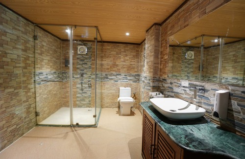 Samaguri Hotel | Relax at Summit Green Lake Tea Resort & Spa with Pool Access