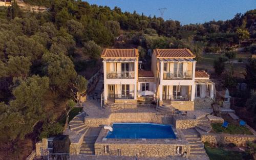 Evgiros Villa | Oceanfront Bliss at Sun And Stone with Pool Access