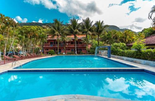 Maresias House | Comfortable 2-Bedroom Flat with Pool & Ocean Views