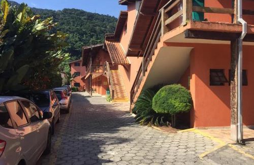 Maresias House | Comfortable 2-Bedroom Flat with Pool & Ocean Views