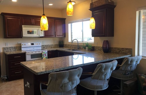 Tres Lomas North House | Scenic Retreat with Mountain Views and Heated Pool