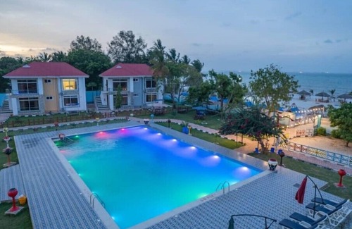 Kigamboni Hotel | Discover Sun N Sand Beach Resort with Pool and Spa Access