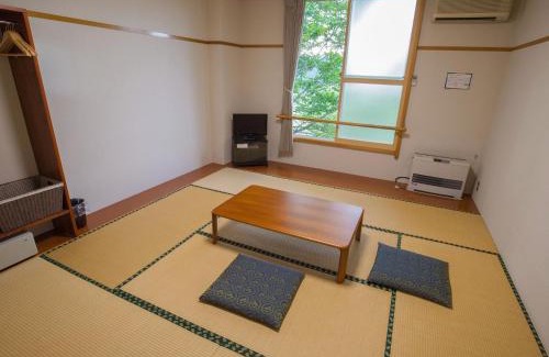 Misato Hotel | Relax at Sun R with Inviting Hot Tub Amenities