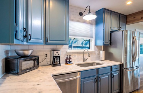Granite Shoals House | Sun rays & lake waves on Lake LBJ! Lakefront, hot tub, SUP, fire pit, games!