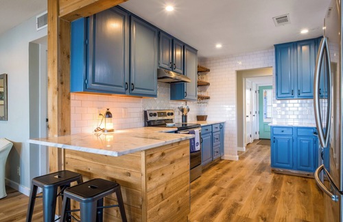 Granite Shoals House | Sun rays & lake waves on Lake LBJ! Lakefront, hot tub, SUP, fire pit, games!