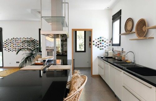 Aubais Villa | Relax in a Heated Pool with Ocean Views and Spa Amenities