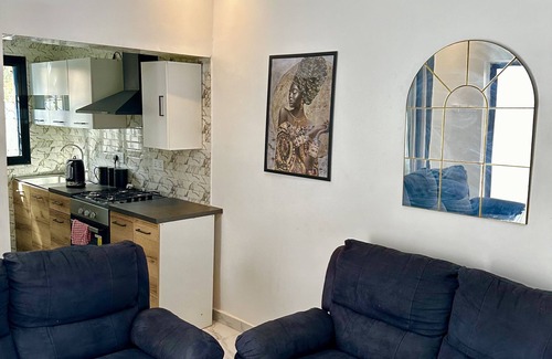 West Coast Division Apartment | Cozy Retreat at Sun Rise Apt #5 with Great Amenities