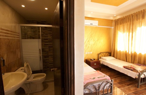 Jabal Al-Hussein Hotel | Relax at Sun Rise Hotel with Restaurant & Family Amenities