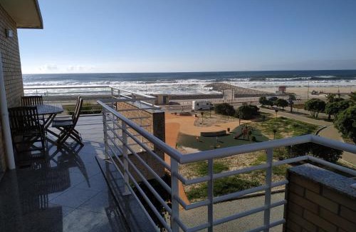 Mozelos Apartment | Beachfront Escape: Sun, Sky and Sea with Ocean Views