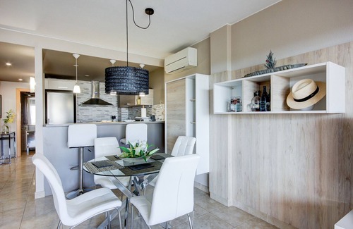 El Mas Isaac Apartment | Relax at Sun Village P2: Pool, Spa & Family Amenities
