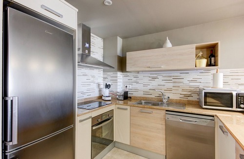 El Mas Isaac Apartment | Relax at Sun Village P2: Pool, Spa & Family Amenities