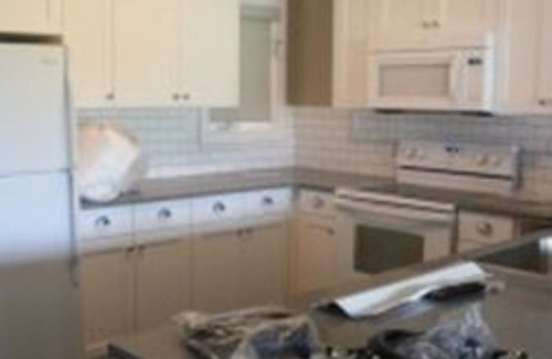 East Kootenay Condo | Relax at Sunchaser Riverside Villas with Pool and Kitchen